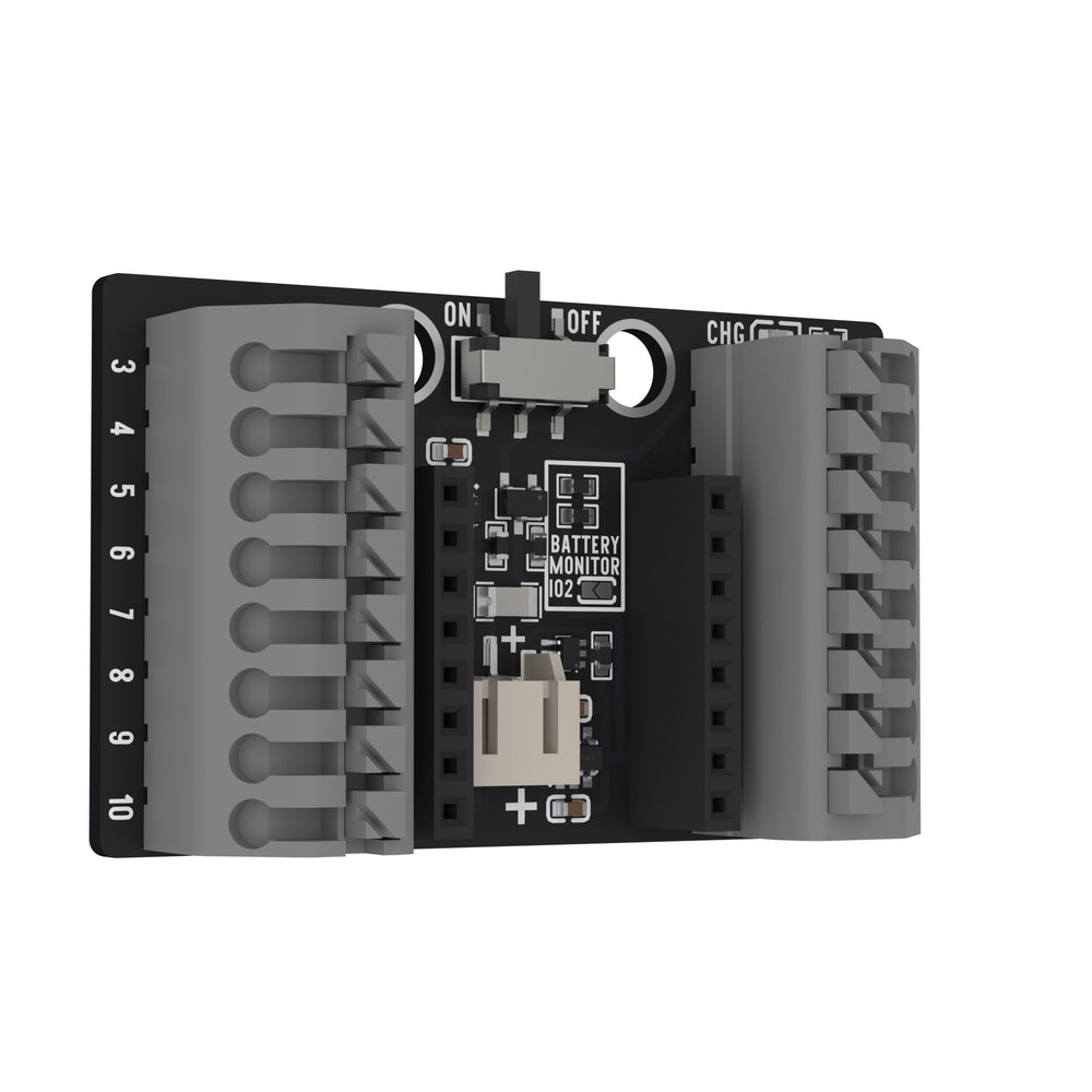 The ESP32-C3 OLED pluggable terminal base tilted away from the camera on its left edge.